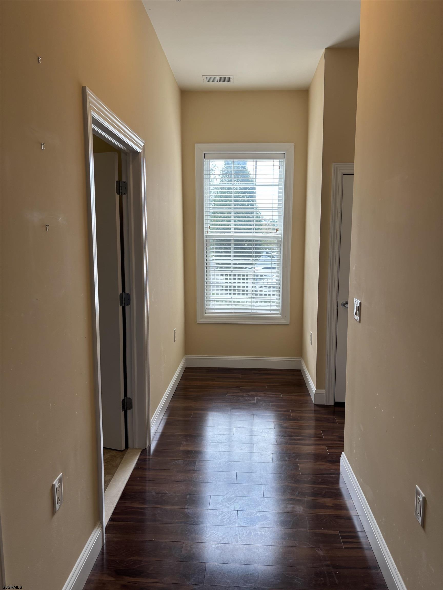 1 Mechanic Street, Unit 108 Absecon, NJ 08201 - Photo 8 of 28 a view of hallway with wooden floor