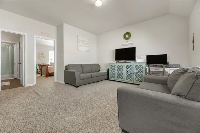 a living room with furniture and a couch