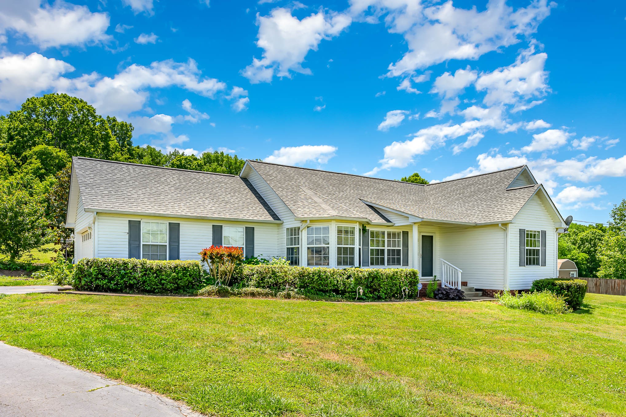 523 D V Circle Spring Hill, TN 37174 - Photo 2 of 25 a front view of a house with garden