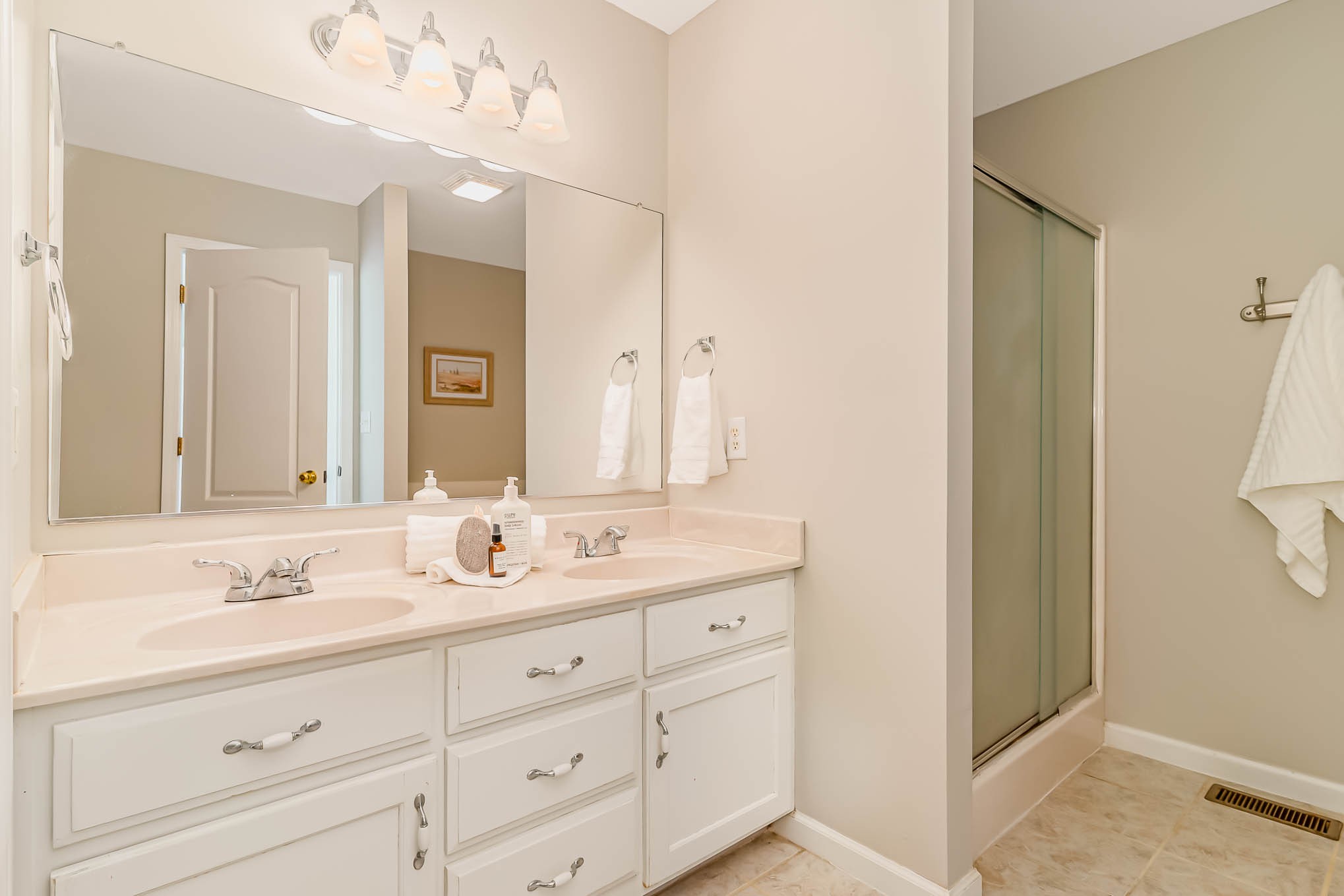 523 D V Circle Spring Hill, TN 37174 - Photo 16 of 25 a bathroom with a sink double vanity and a mirror