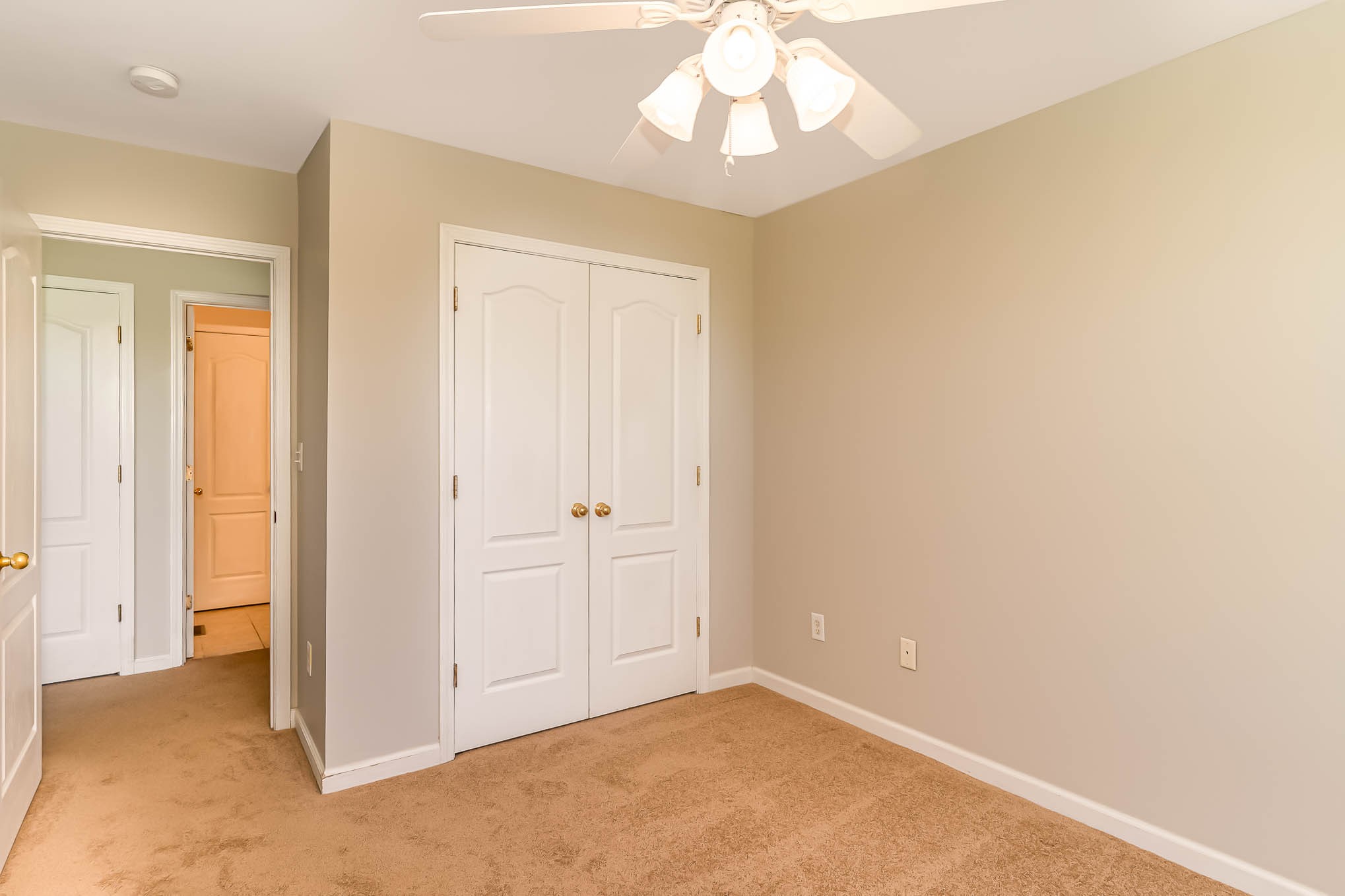 523 D V Circle Spring Hill, TN 37174 - Photo 19 of 25 an empty room with a chandelier fan