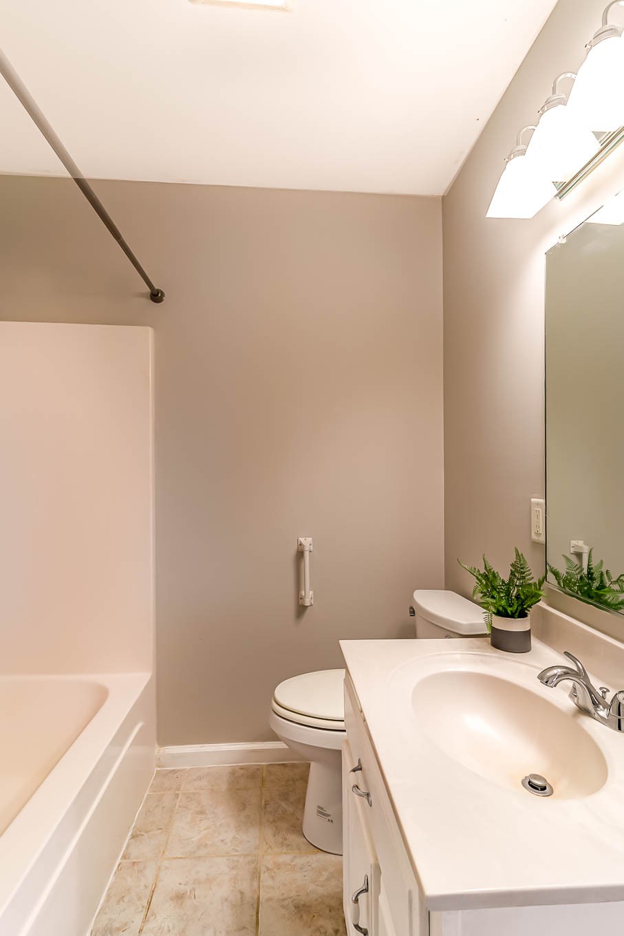 523 D V Circle Spring Hill, TN 37174 - Photo 20 of 25 a bathroom with a sink a toilet and bathtub