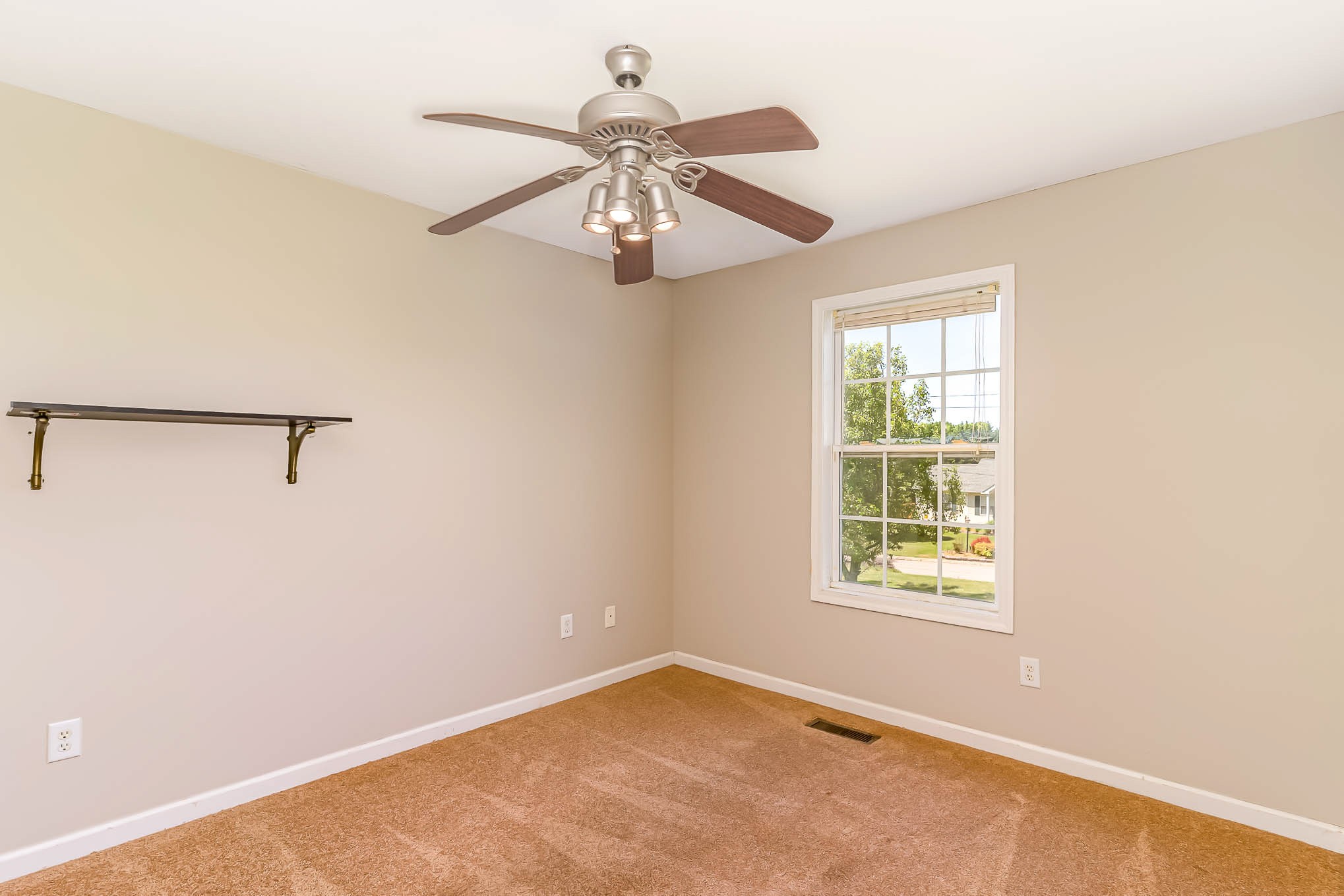 523 D V Circle Spring Hill, TN 37174 - Photo 21 of 25 an empty room with windows and fan