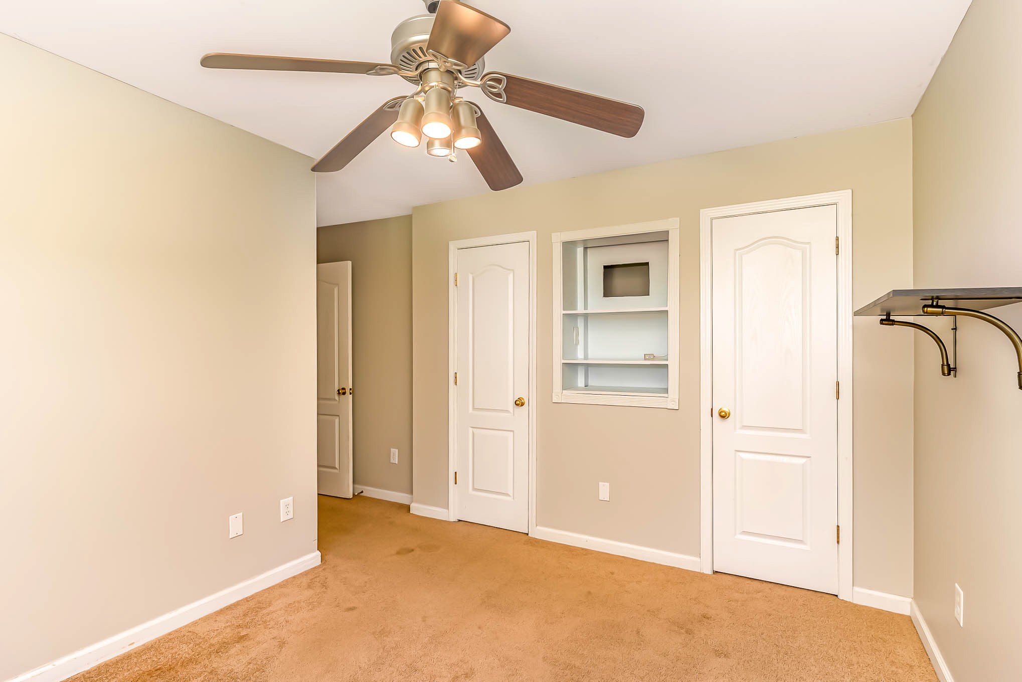523 D V Circle Spring Hill, TN 37174 - Photo 22 of 25 a view of empty room with window and wooden floor