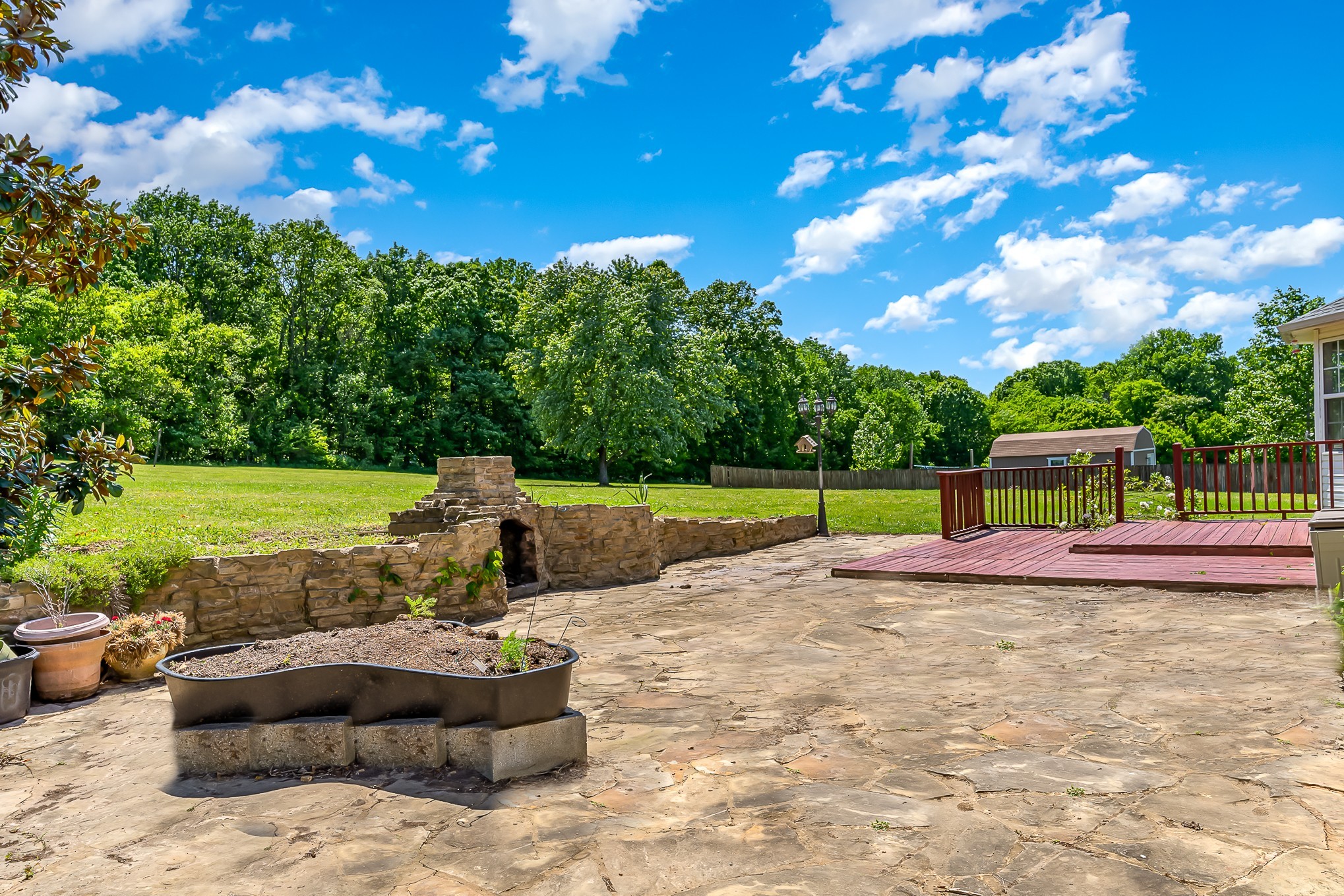 523 D V Circle Spring Hill, TN 37174 - Photo 24 of 25 a view of a garden with a patio