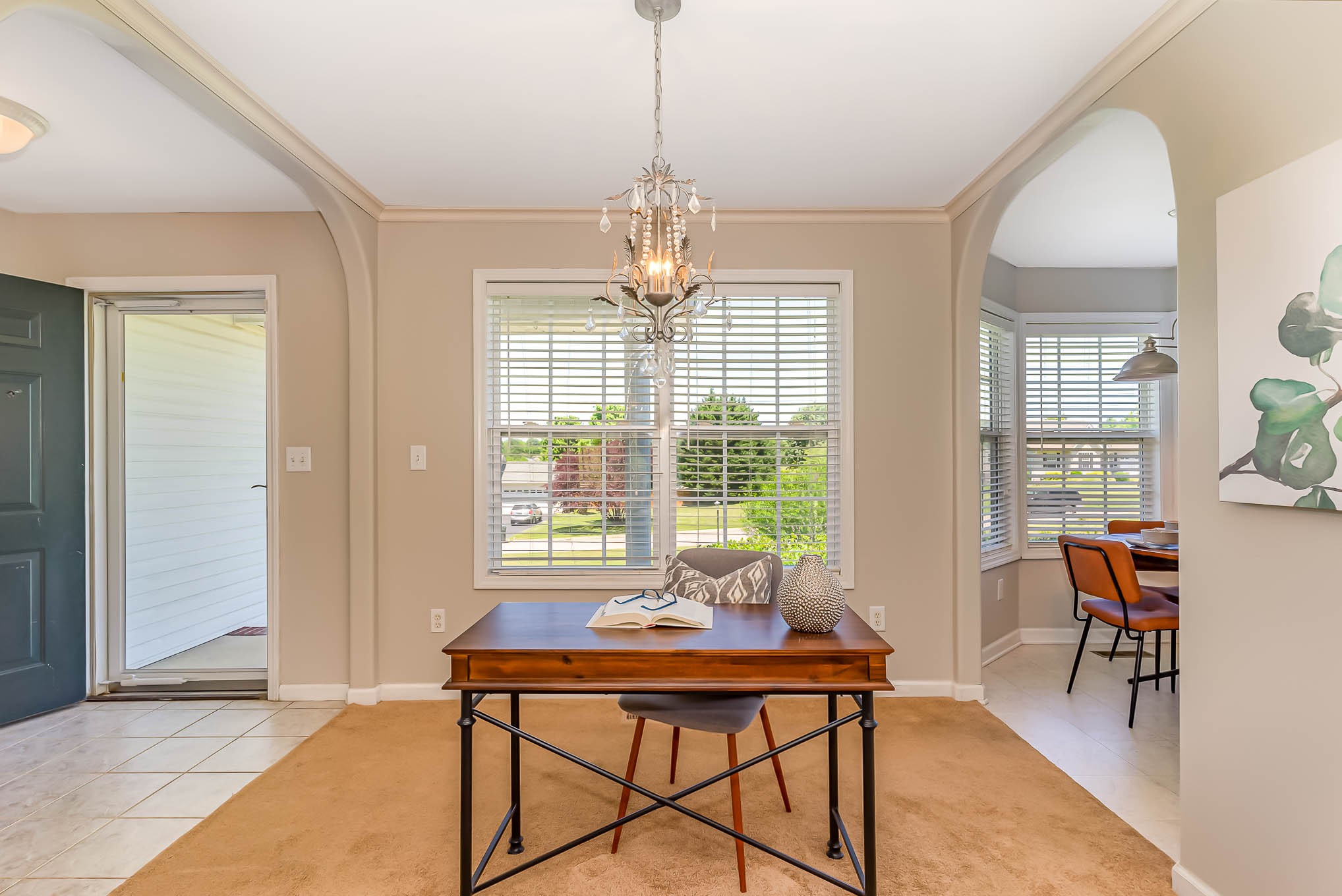 523 D V Circle Spring Hill, TN 37174 - Photo 5 of 25 a dining room with furniture a chandelier and wooden floor