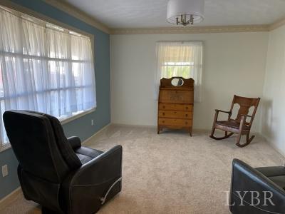 2548 Halifax Road Chatham, VA 24531 - Photo 11 of 21 a living room with furniture and a window