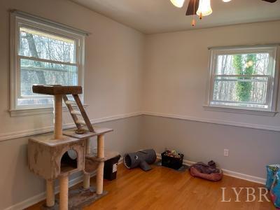 2548 Halifax Road Chatham, VA 24531 - Photo 9 of 21 a room with gym equipment and a window