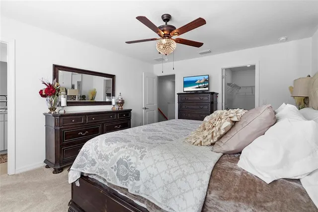 a view of a bathroom with a sink and mirror