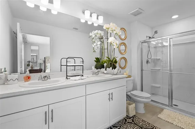 a view of storage and utility room with washer and dryer