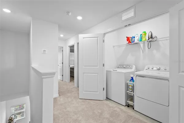 a view of a swimming pool with a lake view