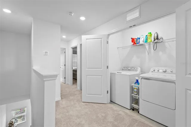 a view of a swimming pool with a lake view