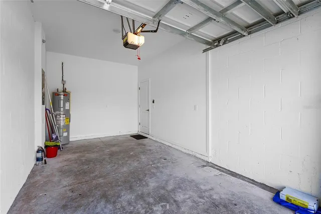 a view of a lake with houses in the background