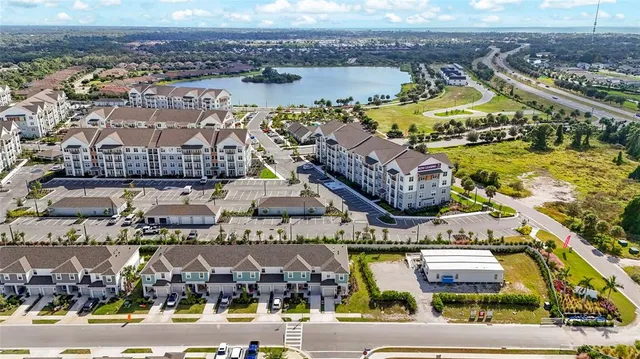 a view of yard with swimming pool and green space