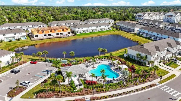 a view of a balcony with a tree