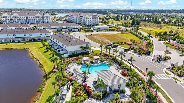 a view of a golf course with a lake