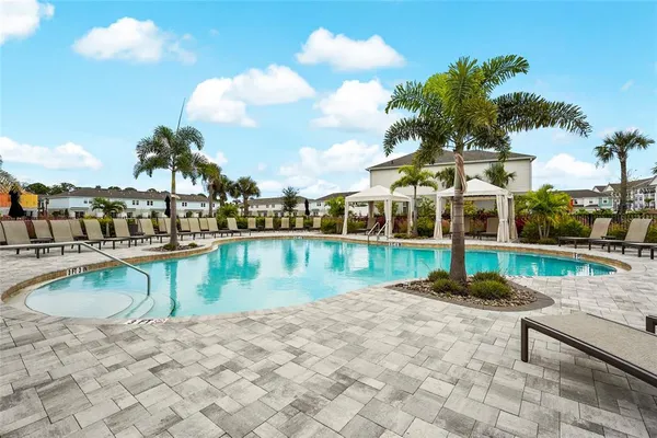 a sign that is on a brick wall