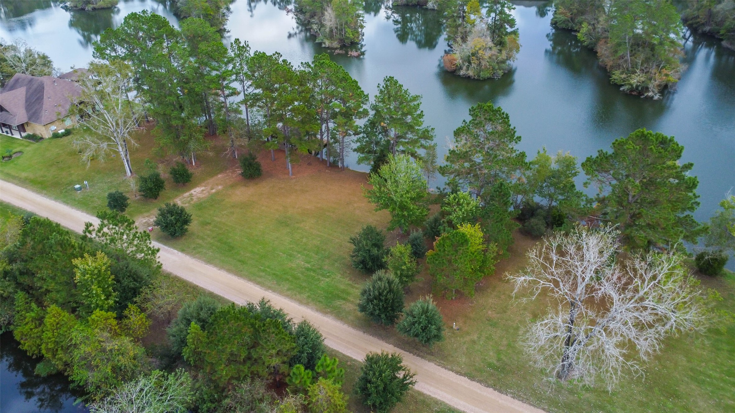 17-16 A Smith Loop North Cleveland, TX 77327 - Photo 15 of 38 an aerial view of lake