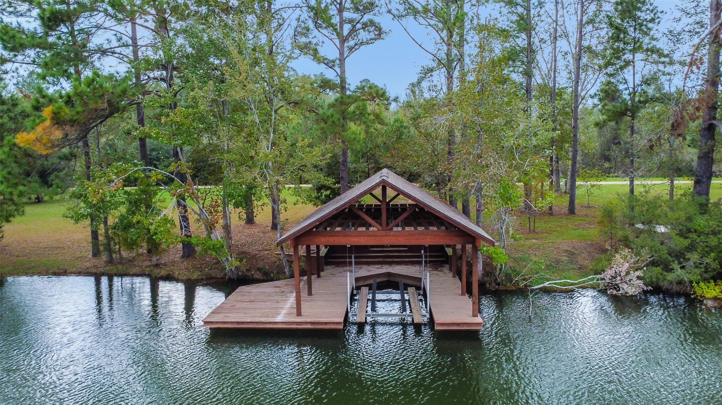17-16 A Smith Loop North Cleveland, TX 77327 - Photo 23 of 38 a front view of a house with a yard