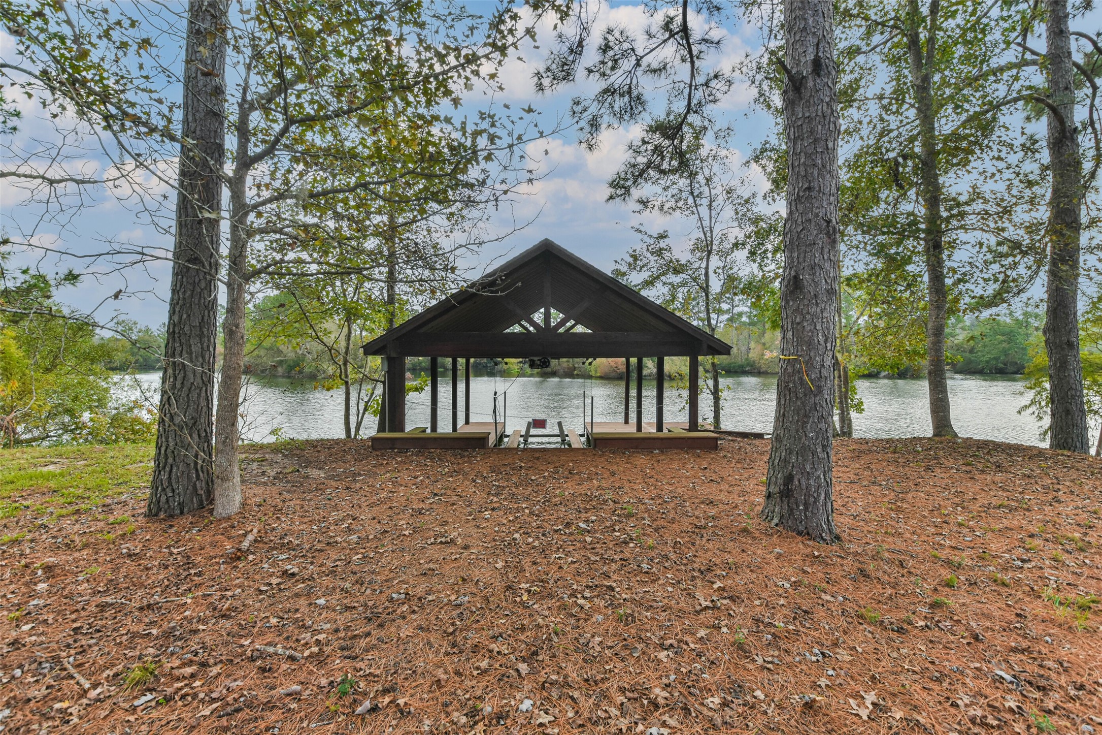 17-16 A Smith Loop North Cleveland, TX 77327 - Photo 31 of 38 a front view of a house with a yard and an trees