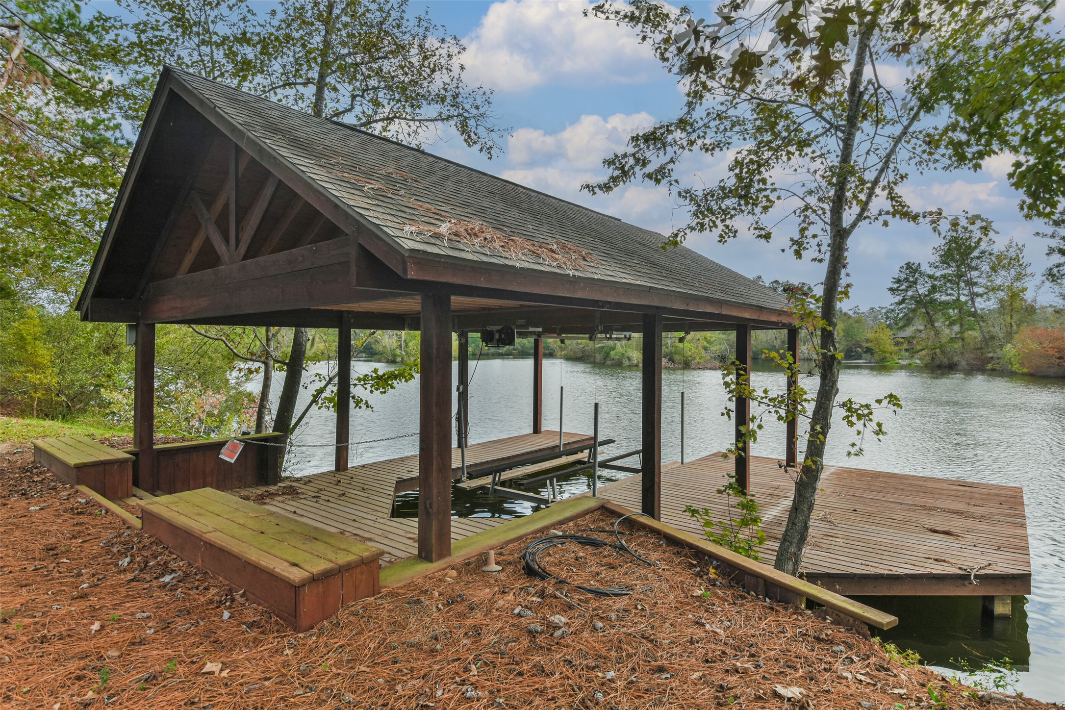 17-16 A Smith Loop North Cleveland, TX 77327 - Photo 33 of 38 a view of a patio with a table chairs and a backyard
