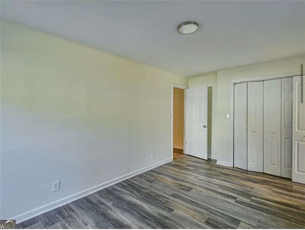 24 East Main Street Gainesville, GA 30501 - Photo 7 of 14 a view of a room with wooden floor