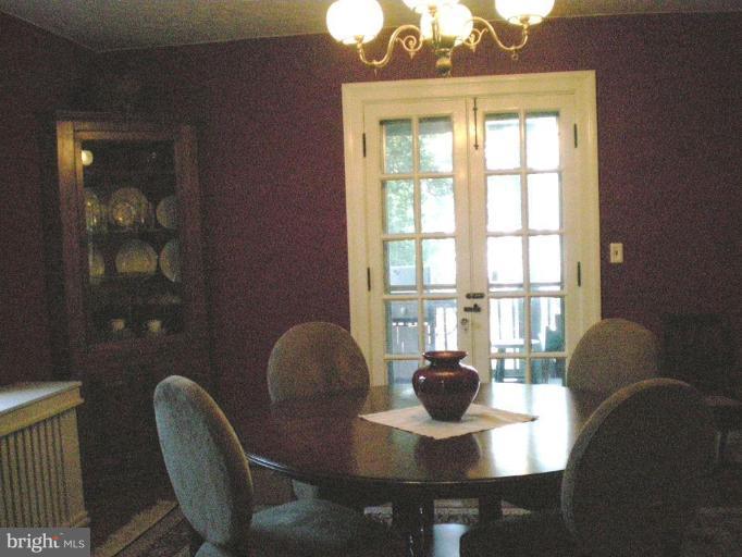1503 Frederick Road Catonsville, MD 21228 - Photo 10 of 23 a dining room with furniture and window