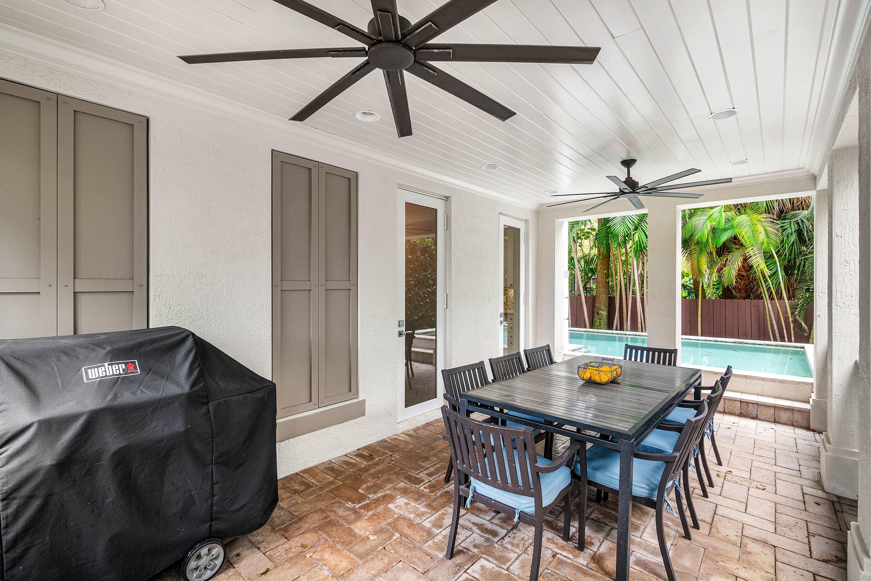 1108 Coconut Row Delray Beach, FL 33483 - Photo 28 of 31 a view of a dining room with furniture window and outside view