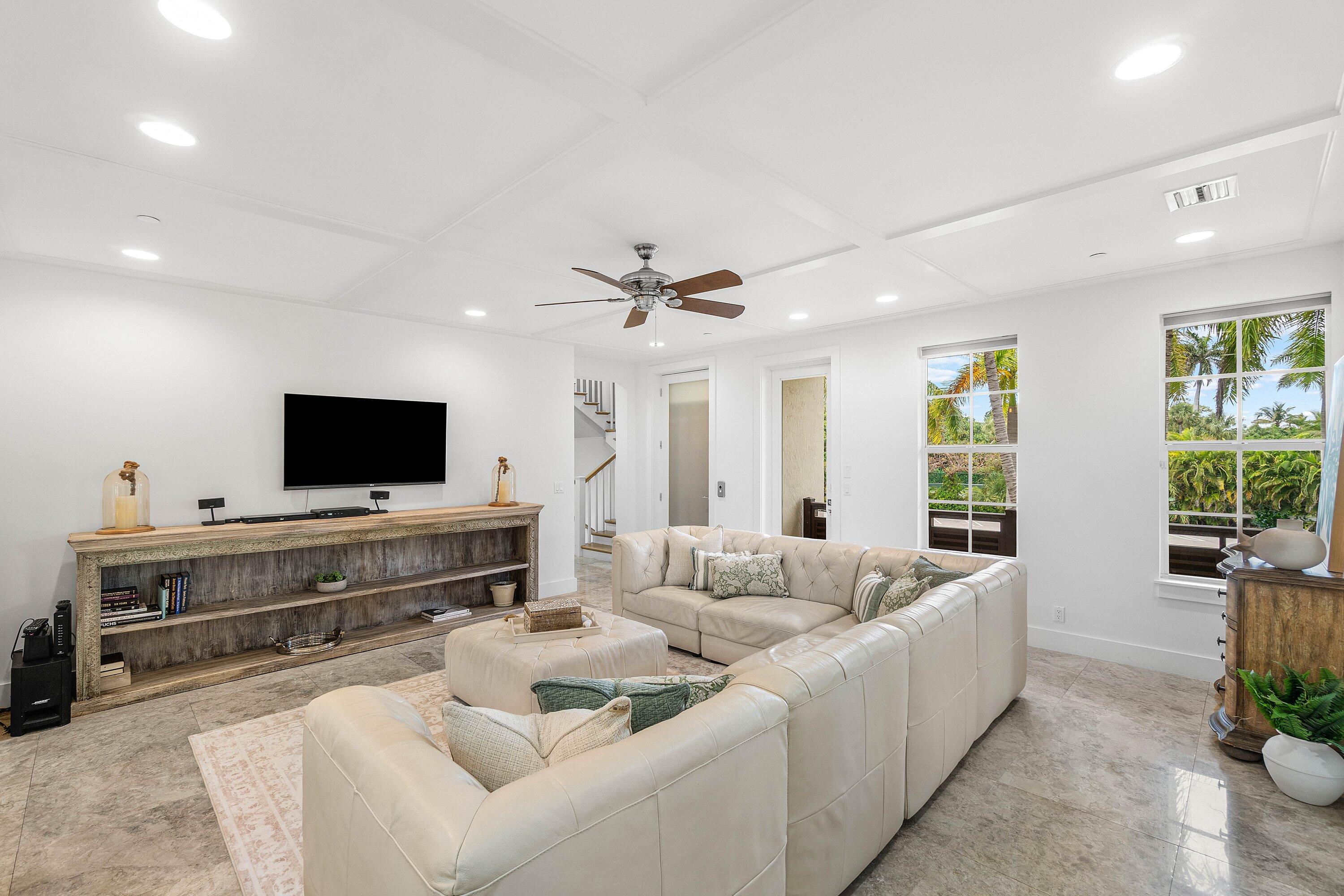 1108 Coconut Row Delray Beach, FL 33483 - Photo 7 of 31 a living room with furniture and a flat screen tv