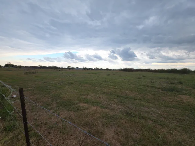 a view of an ocean and mountain