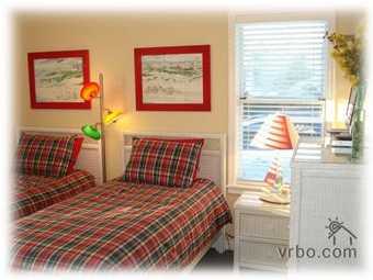 110 Sand Dunes Road Santa Rosa Beach, FL 32459 - Photo 13 of 15 a bedroom with a bed and a window with outer view