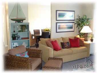 110 Sand Dunes Road Santa Rosa Beach, FL 32459 - Photo 2 of 15 a living room with furniture and a table