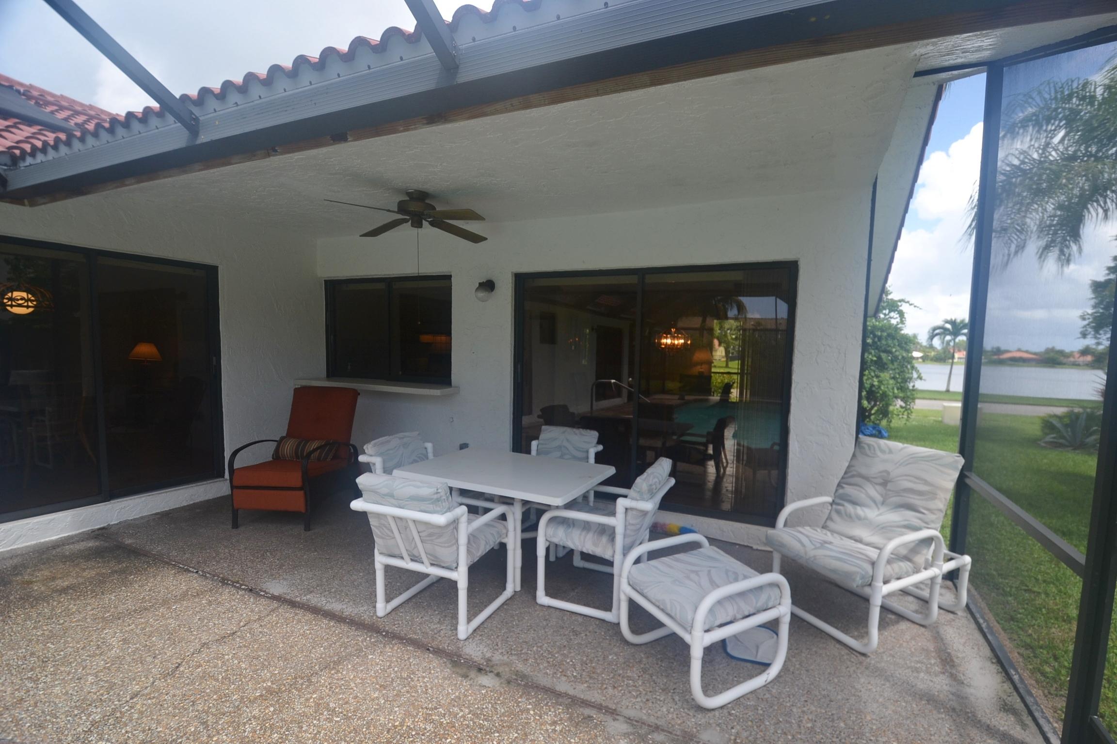 460 Northwest 70th Street Boca Raton, FL 33487 - Photo 13 of 36 porch and lake