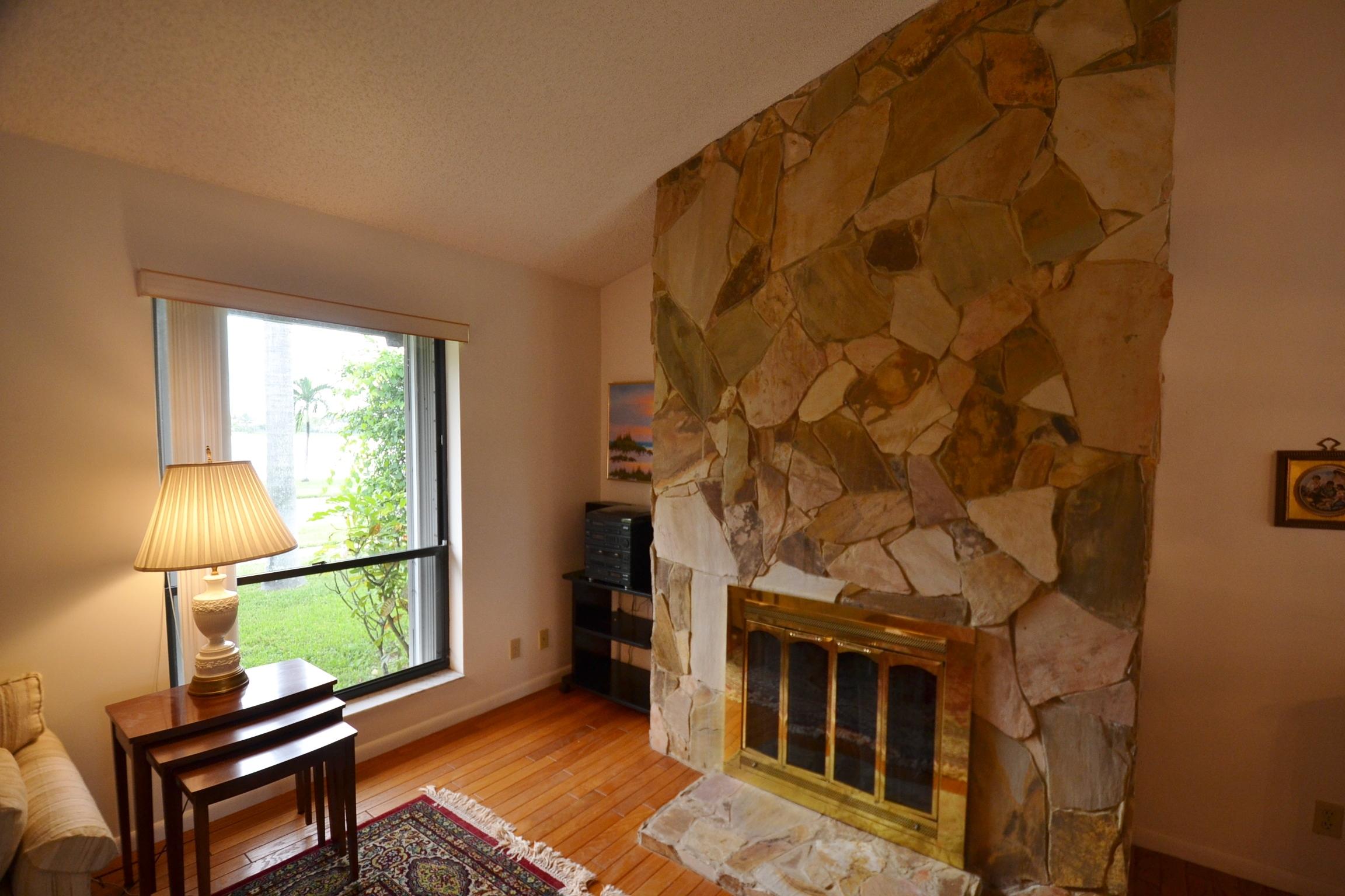 460 Northwest 70th Street Boca Raton, FL 33487 - Photo 18 of 36 lr fireplace