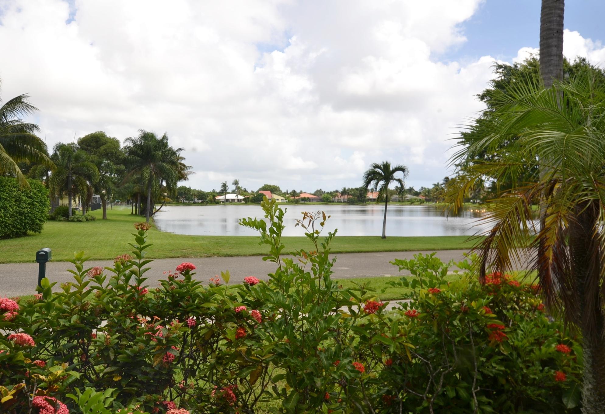 460 Northwest 70th Street Boca Raton, FL 33487 - Photo 5 of 36 lake view from lr window