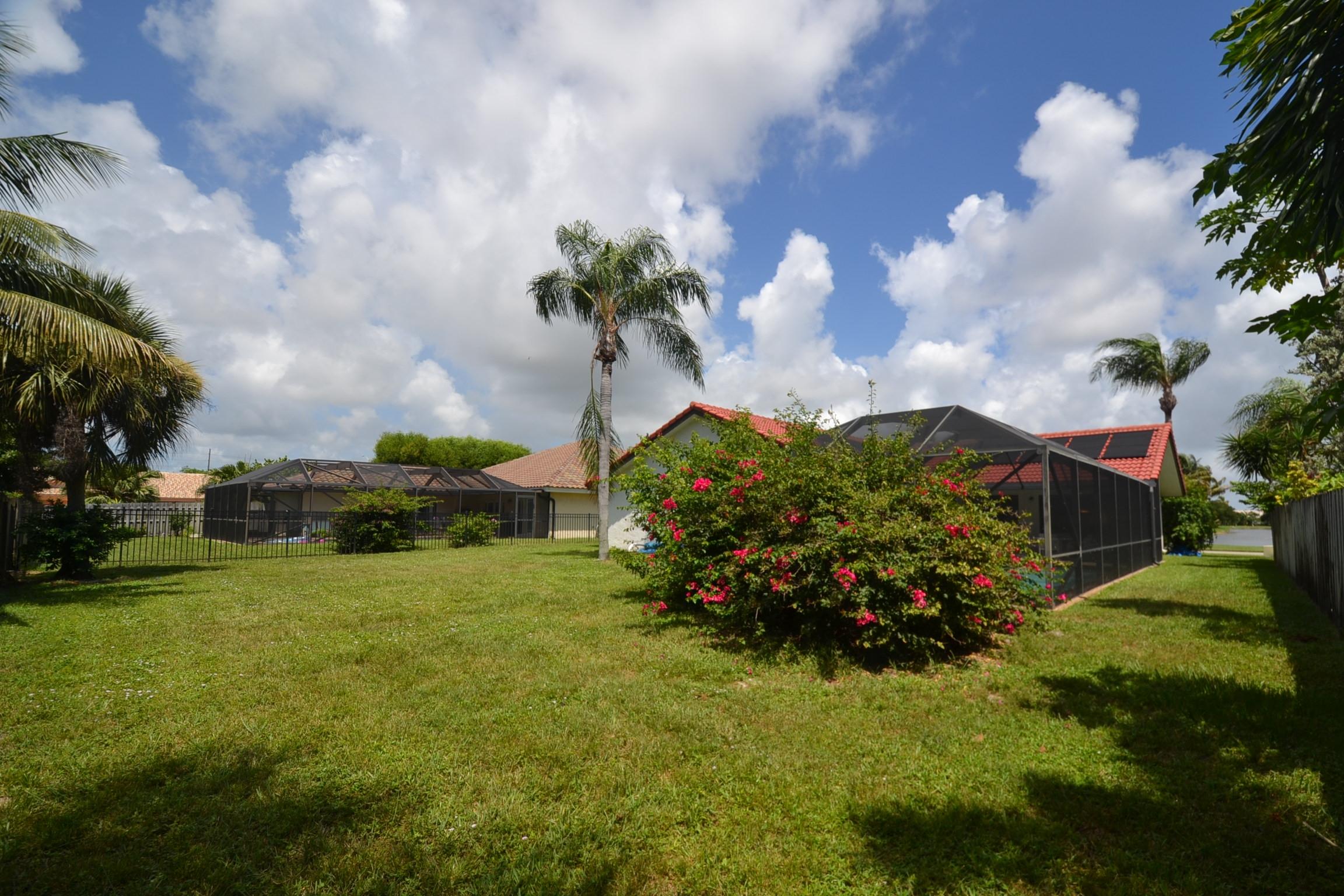 460 Northwest 70th Street Boca Raton, FL 33487 - Photo 6 of 36 rear ext