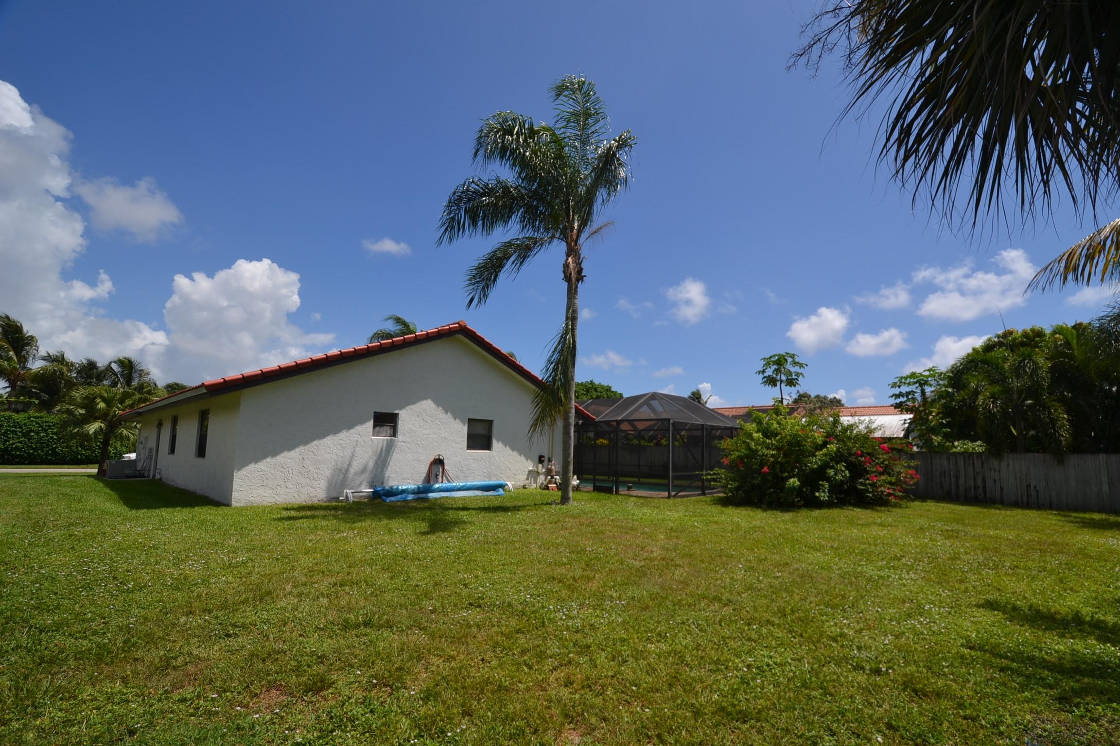 460 Northwest 70th Street Boca Raton, FL 33487 - Photo 7 of 36 rear ext2
