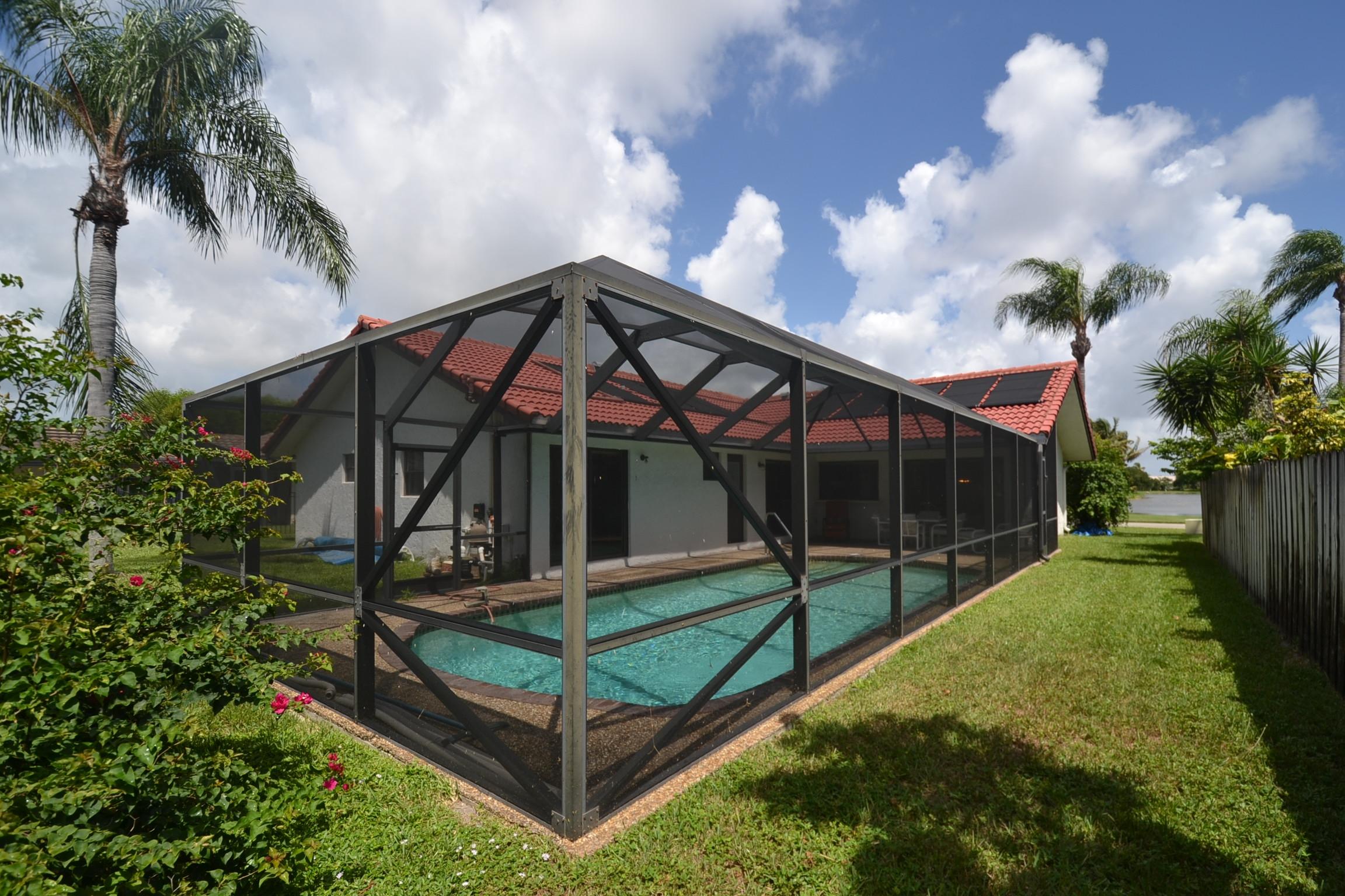 460 Northwest 70th Street Boca Raton, FL 33487 - Photo 9 of 36 pool ext and lake