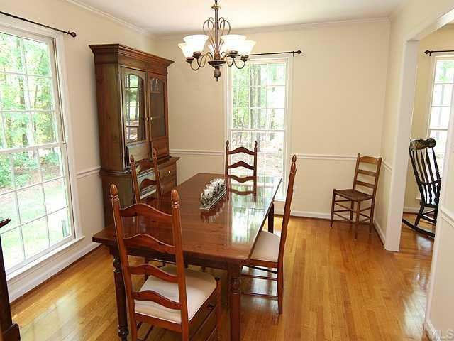 10033 Sycamore Road Raleigh, NC 27613 - Photo 3 of 12 11.0 x 13.4, Hardwoods, Crown Molding, Chairrail, Permited for 4 Bedrooms, Bonus & Gameroom in Basement! Dining Room