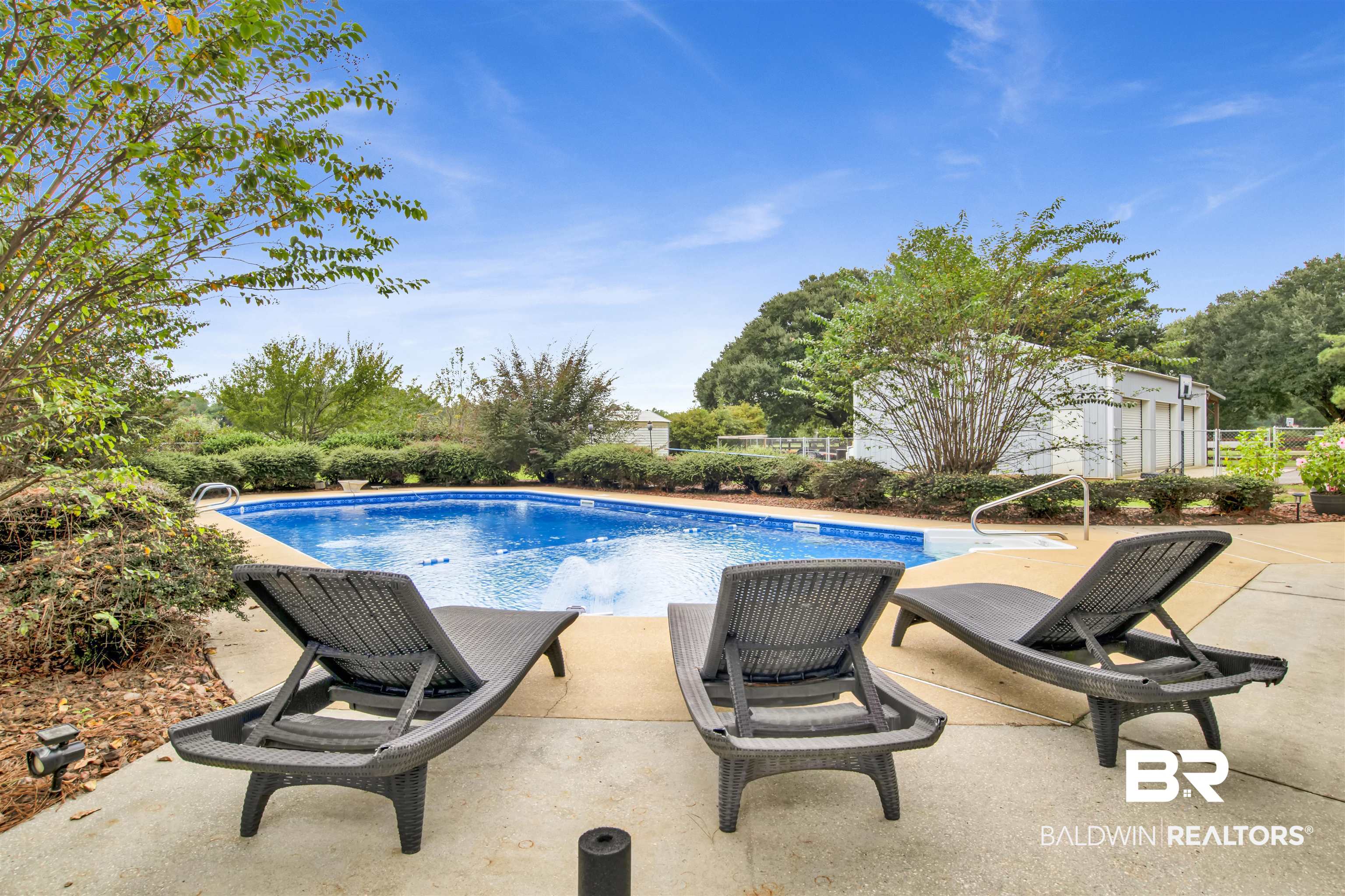 13385 Tom Gaston Road Mobile, AL 36695 - Photo 5 of 42 View of swimming pool with a patio area