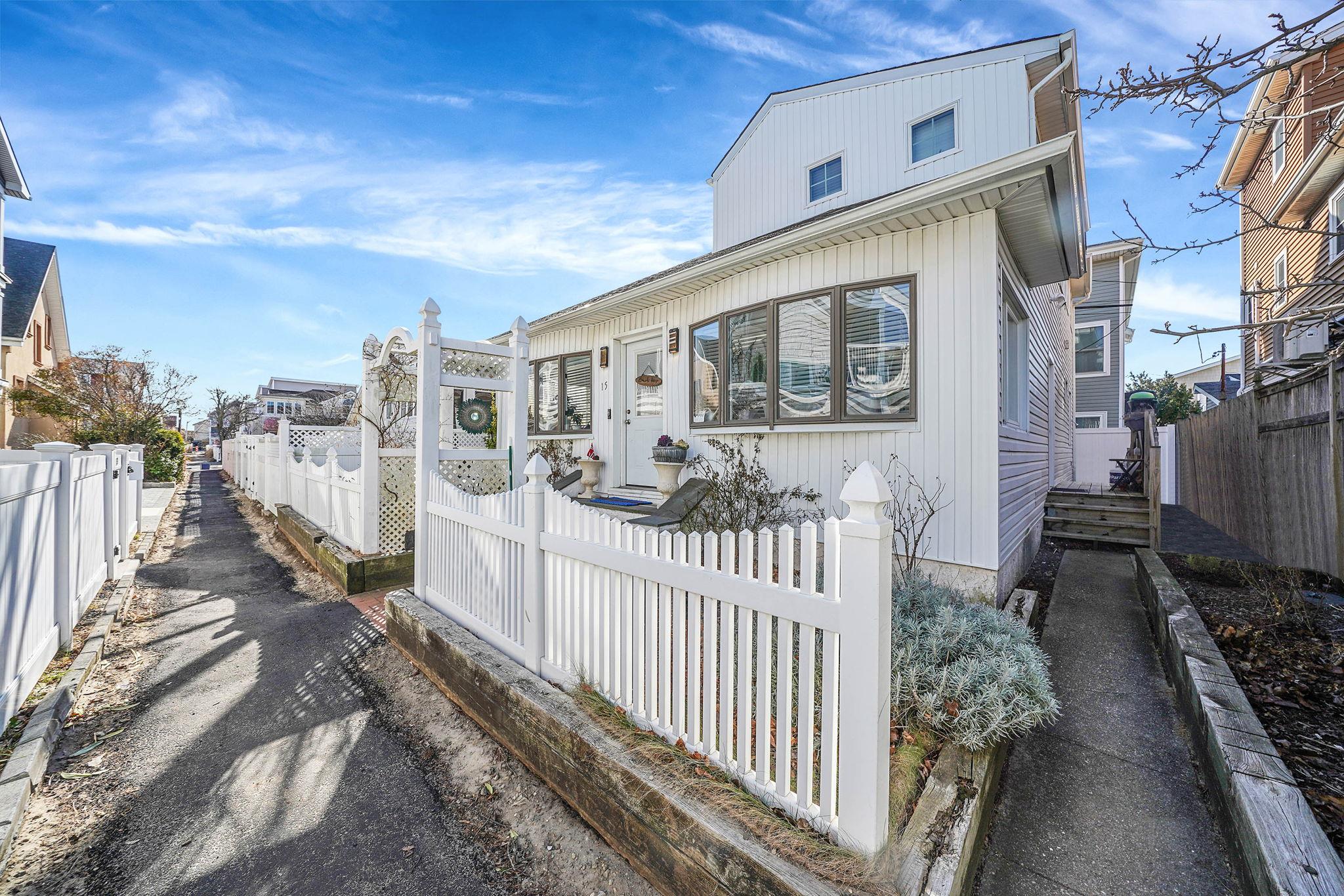 View of front of property with a fenced front yard