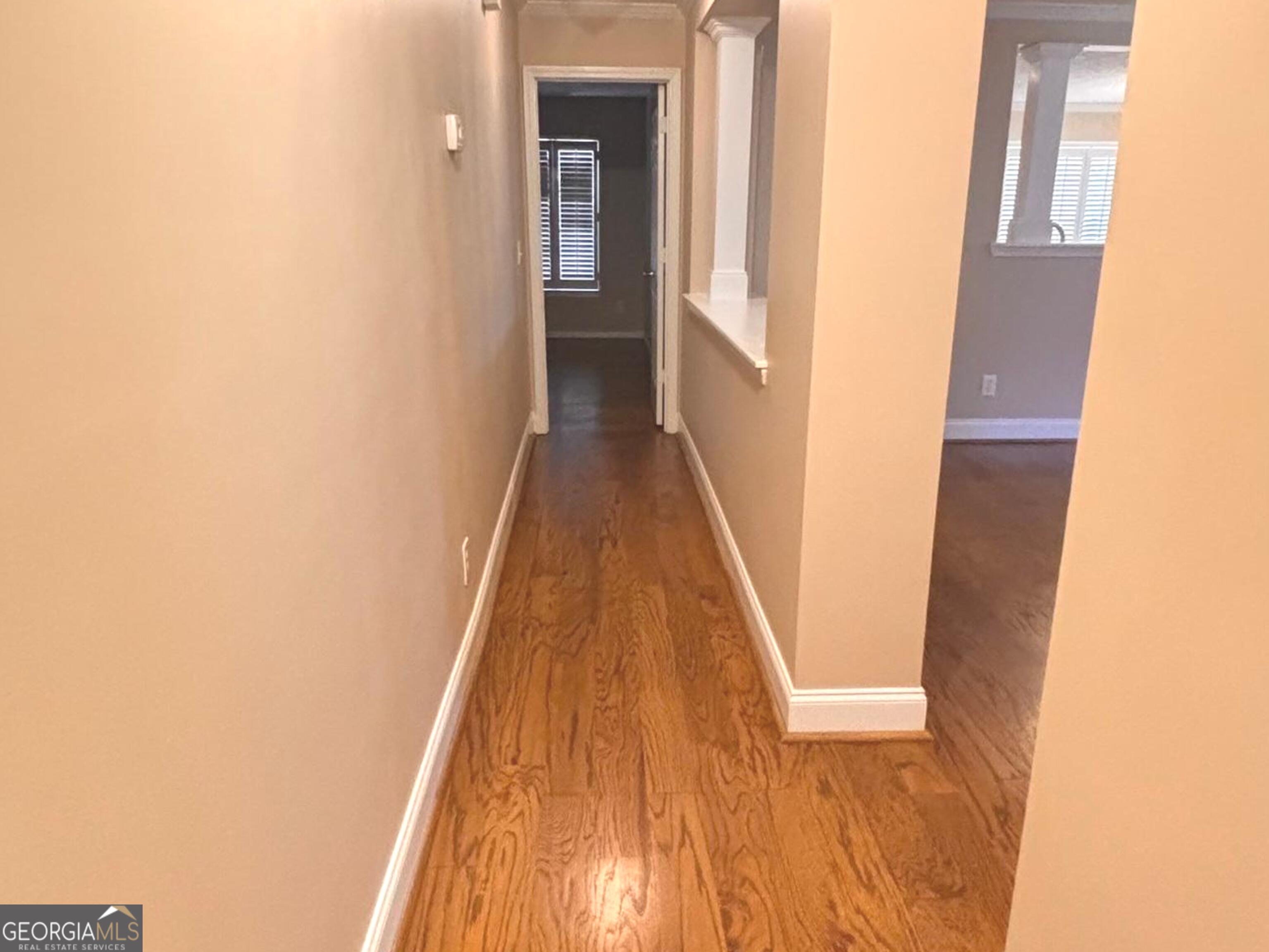 120 Cedar Bay Circle Dallas, GA 30157 - Photo 14 of 27 a view of a hallway with wooden floor