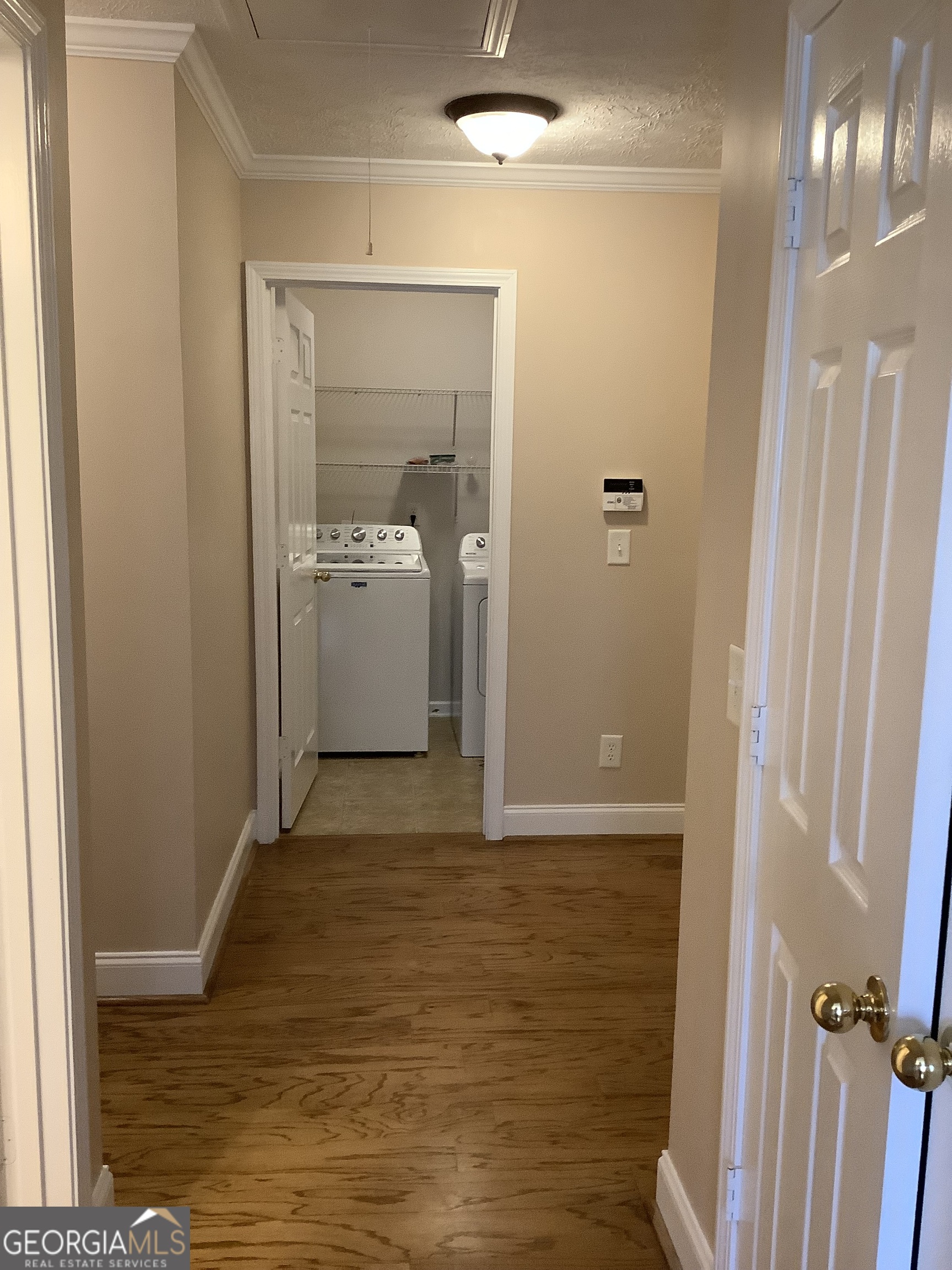 120 Cedar Bay Circle Dallas, GA 30157 - Photo 15 of 27 a view of hallway with wooden floor