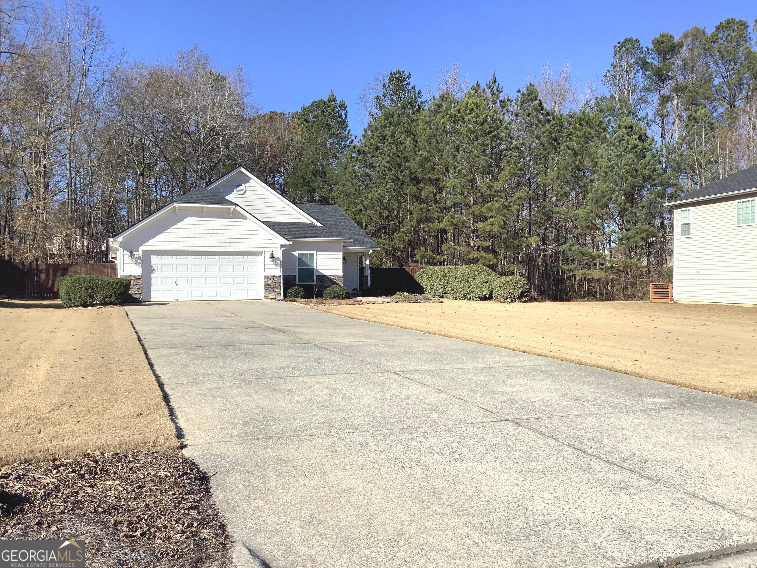 120 Cedar Bay Circle Dallas, GA 30157 - Photo 2 of 27 a view of house with snow on the road