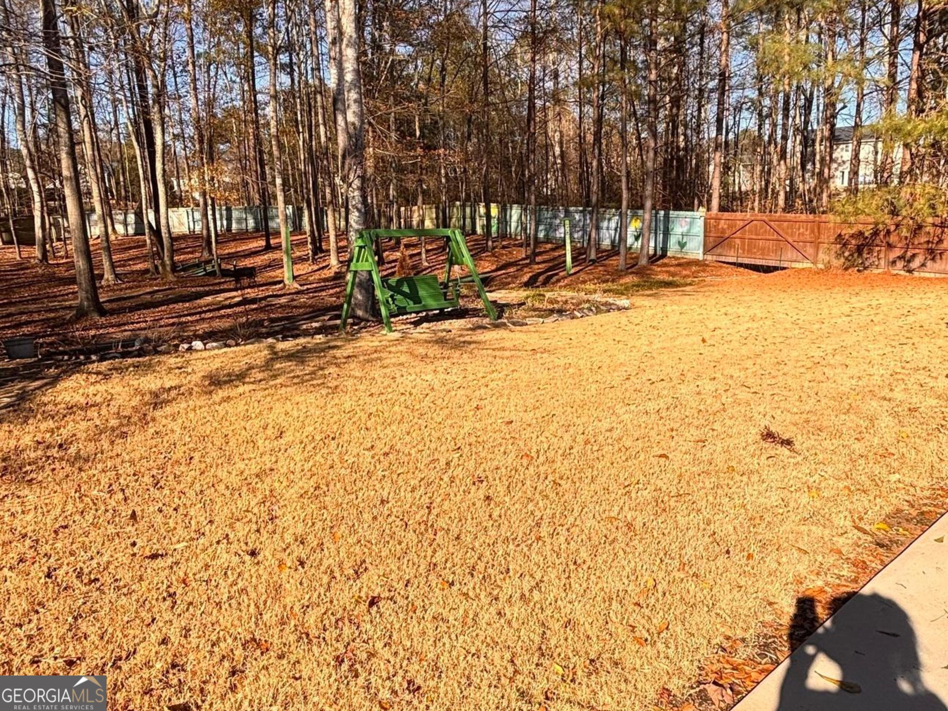 120 Cedar Bay Circle Dallas, GA 30157 - Photo 27 of 27 a view of a yard with wooden fence