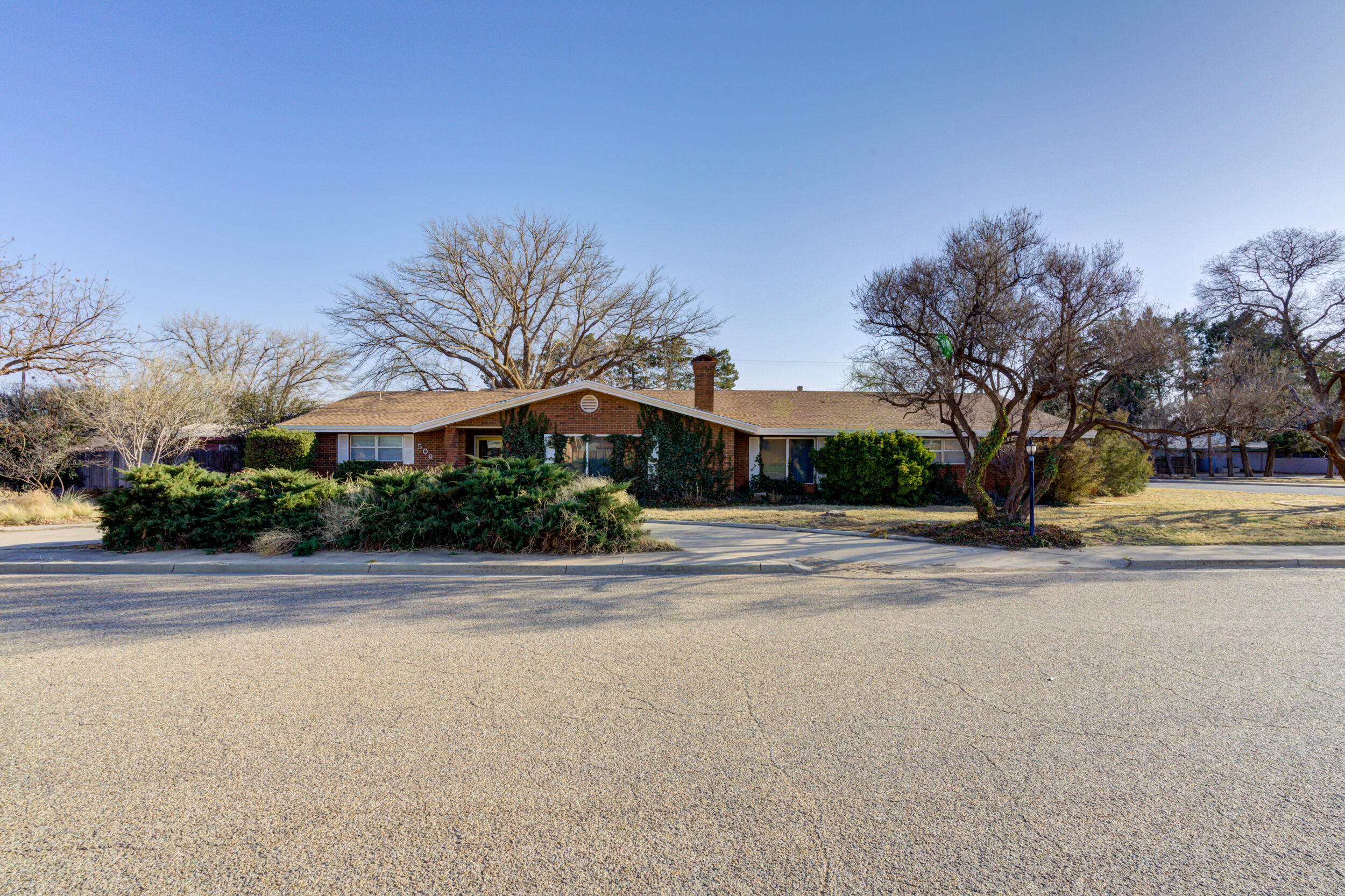 509 18th Street Seagraves, TX 79359 - Photo 1 of 25 a view of a building with a street
