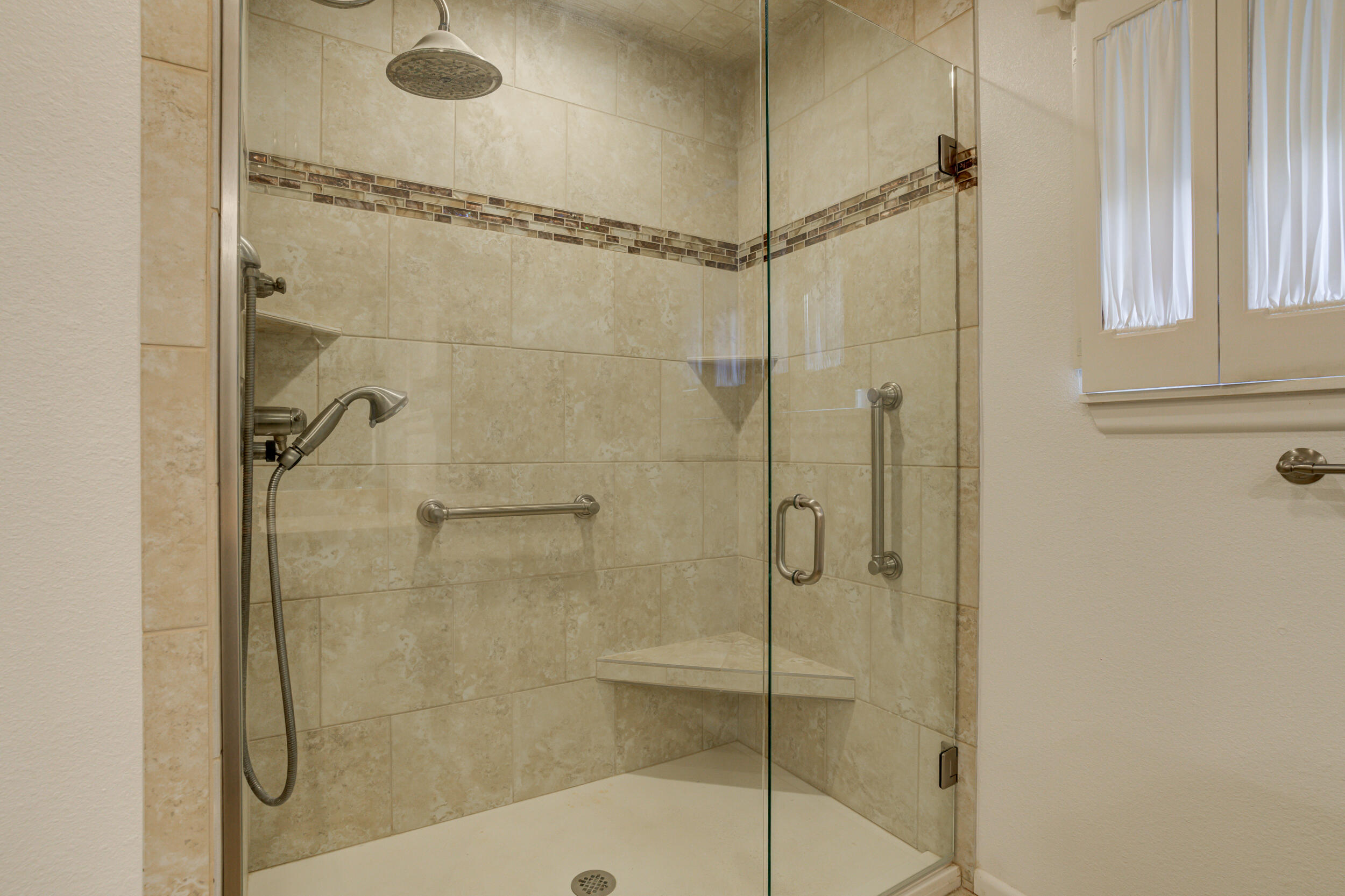 509 18th Street Seagraves, TX 79359 - Photo 20 of 25 a bathroom with a shower