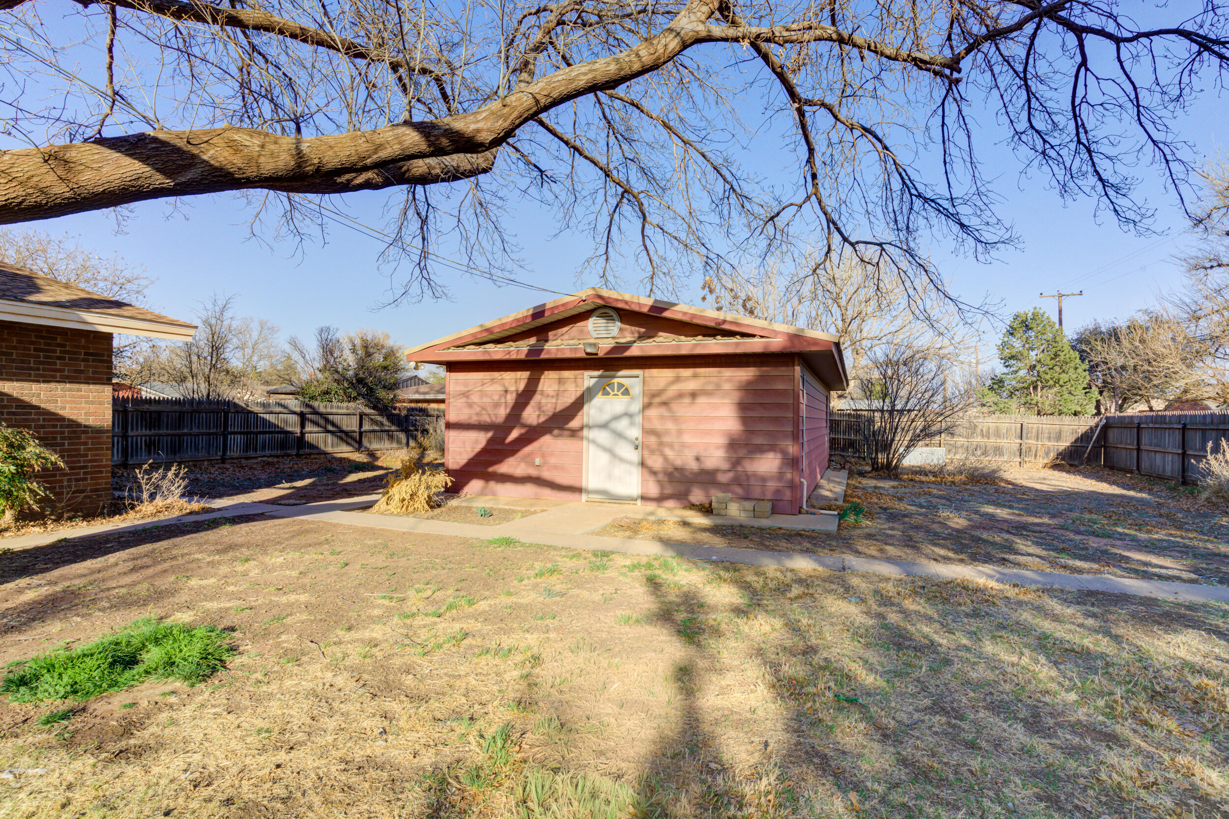 509 18th Street Seagraves, TX 79359 - Photo 3 of 25 a view of a backyard