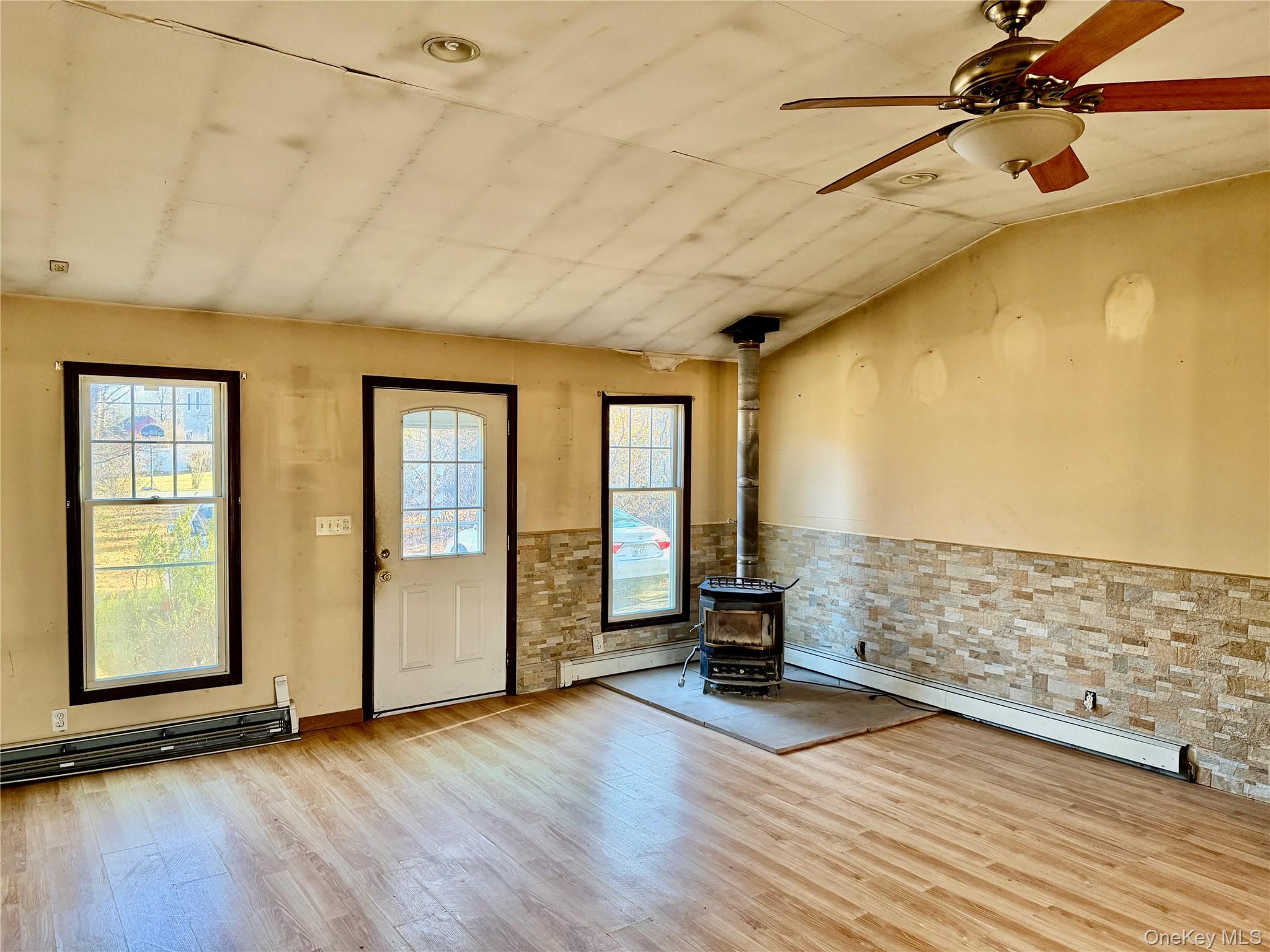 26 North Swezeytown Road Middle Island, NY 11953 - Photo 12 of 27 a view of an empty room with glass door