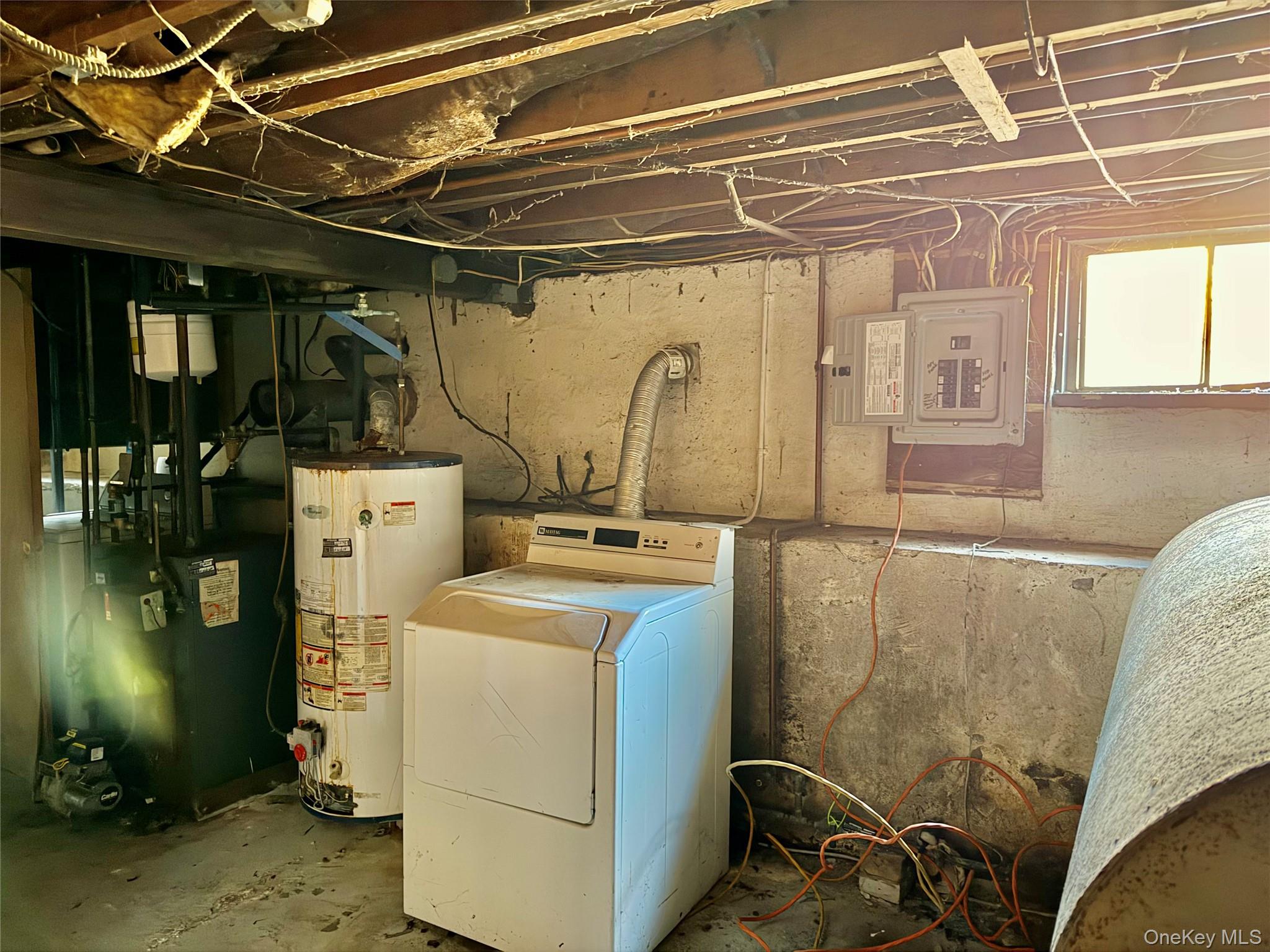26 North Swezeytown Road Middle Island, NY 11953 - Photo 19 of 27 a utility room with dryer and washer